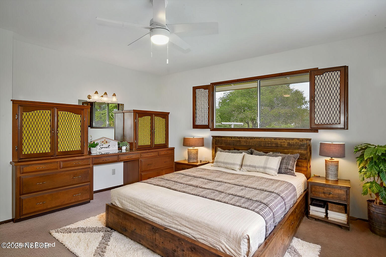 1740 Tularosa Road Lompoc, CA 93436 - Photo 30 of 55 a bedroom with a large bed and a dresser