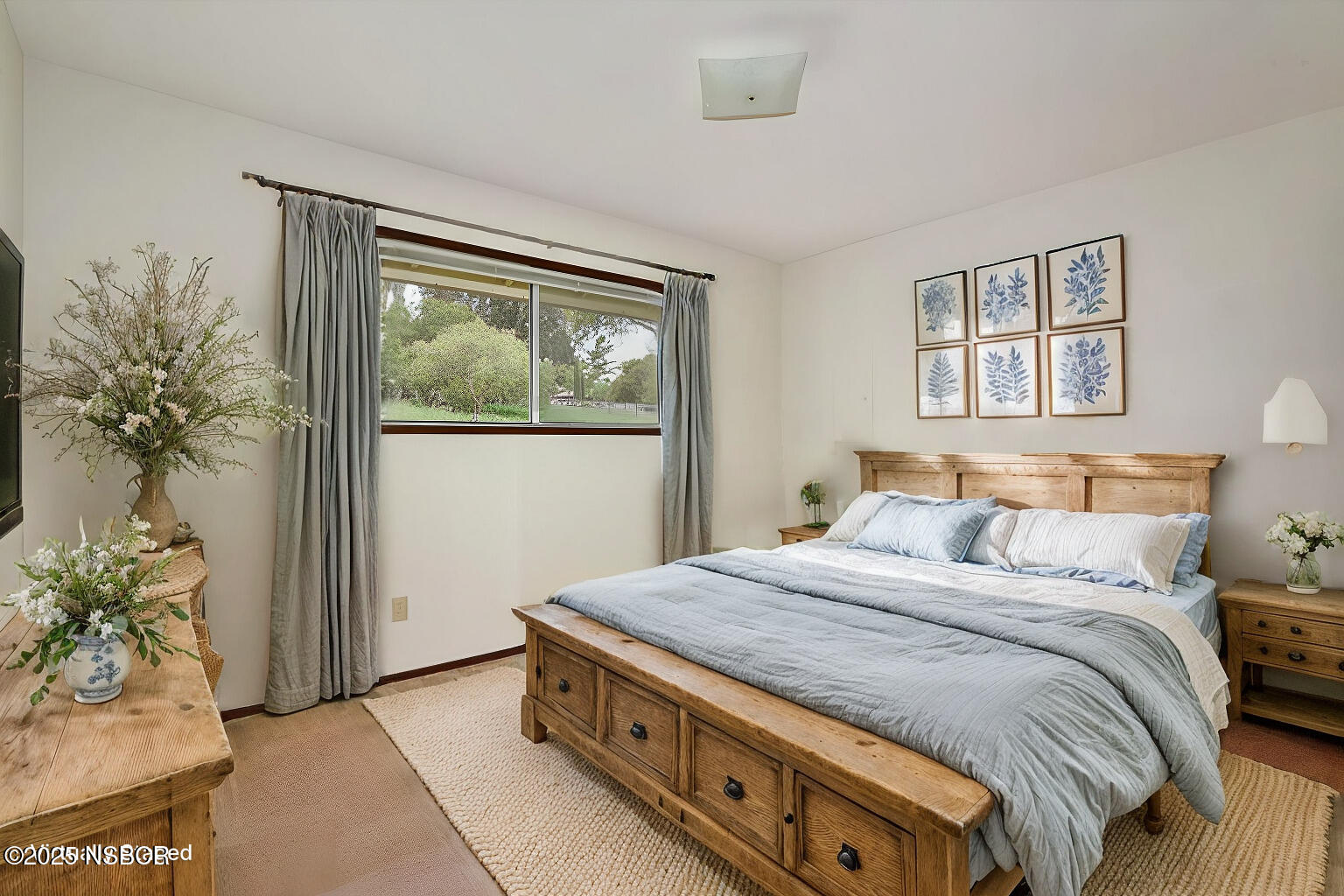 1740 Tularosa Road Lompoc, CA 93436 - Photo 39 of 55 a bedroom with a bed and a painting on the wall