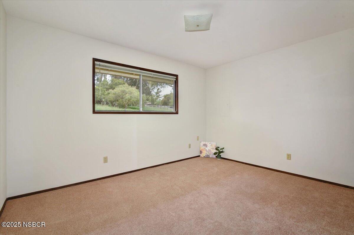 1740 Tularosa Road Lompoc, CA 93436 - Photo 40 of 55 an empty room with a painting
