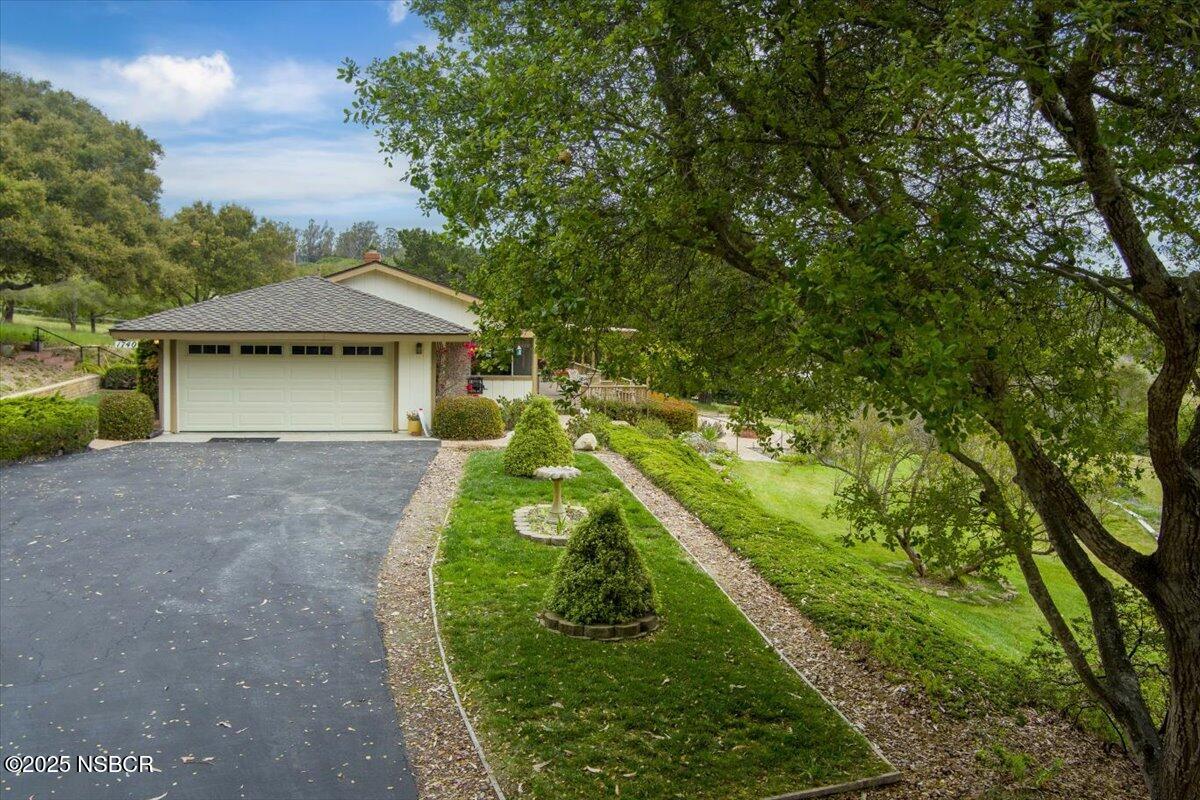 1740 Tularosa Road Lompoc, CA 93436 - Photo 43 of 55 a view of a house with a yard