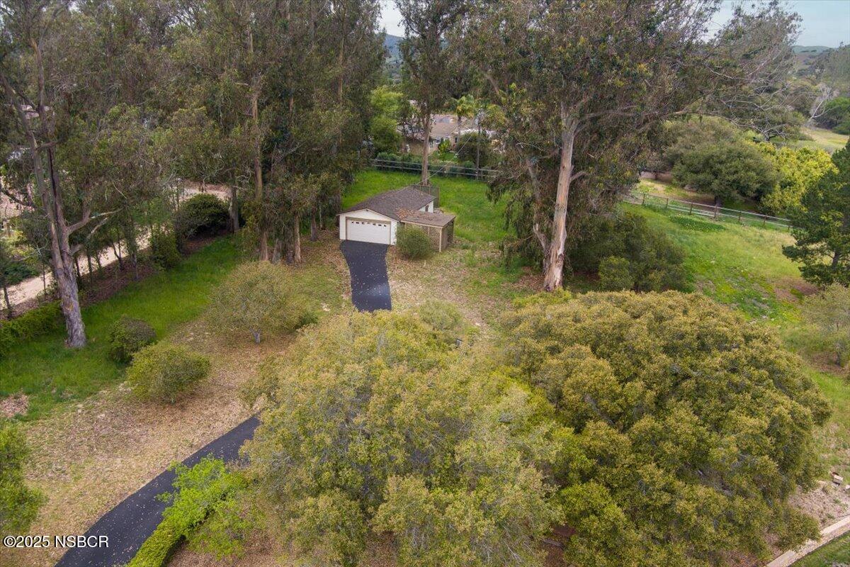 1740 Tularosa Road Lompoc, CA 93436 - Photo 45 of 55 a backyard of a house with a yard and outdoor seating