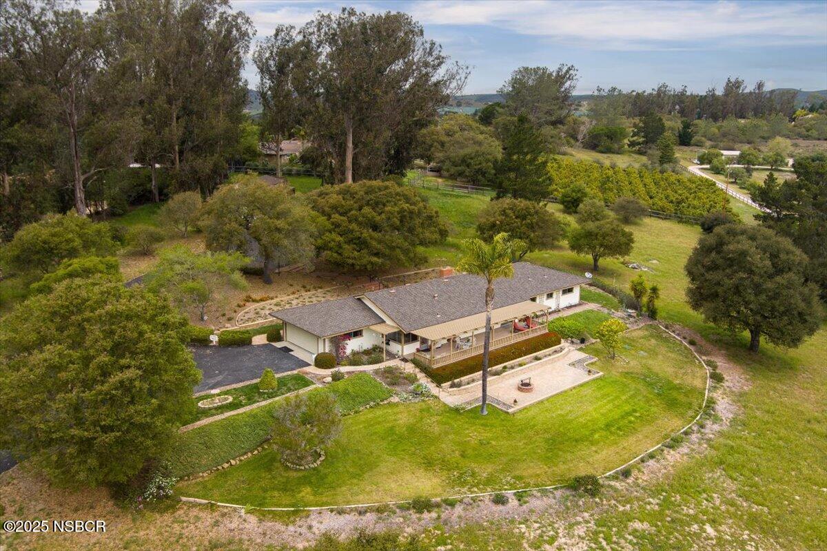 1740 Tularosa Road Lompoc, CA 93436 - Photo 48 of 55 an aerial view of residential houses with yard