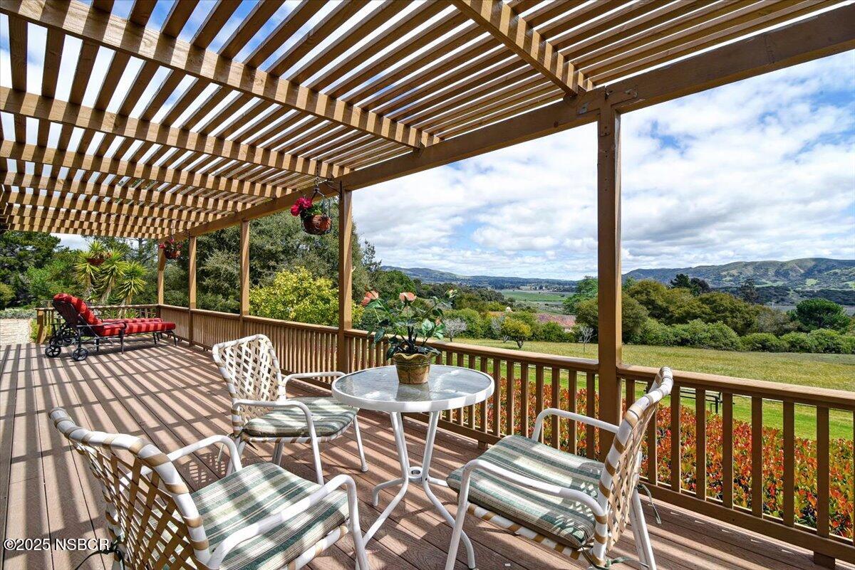 1740 Tularosa Road Lompoc, CA 93436 - Photo 5 of 55 a view of a chairs and table in the balcony
