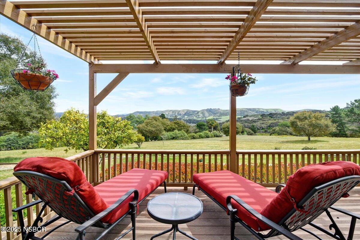 1740 Tularosa Road Lompoc, CA 93436 - Photo 6 of 55 a view of a chairs and table in the balcony
