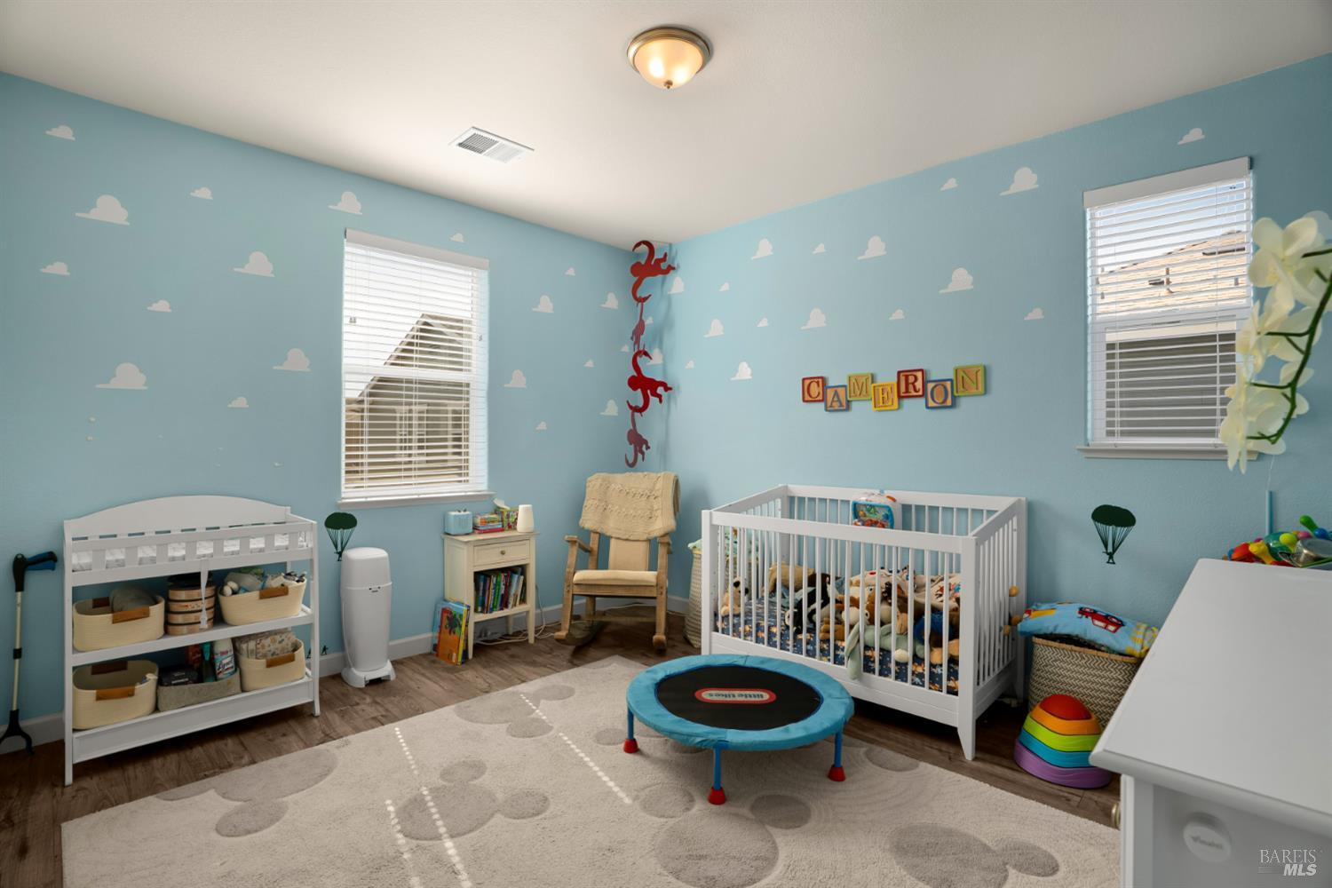 7465 Walker Way Rohnert Park, CA 94928 - Photo 19 of 43 a room with furniture a baby crib and a window