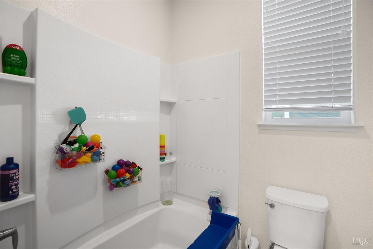 7465 Walker Way Rohnert Park, CA 94928 - Photo 23 of 43 a bathroom with a sink a bathtub and a toilet