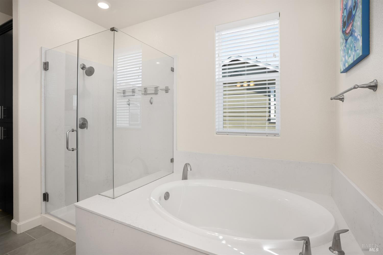 7465 Walker Way Rohnert Park, CA 94928 - Photo 31 of 43 a bathroom with a bathtub and a shower