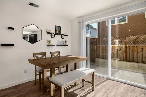 a view of a dining room with furniture