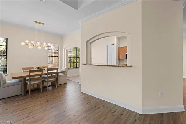 a view of a livingroom with furniture and wooden floor
