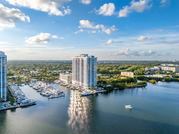 a view of a lake with a city