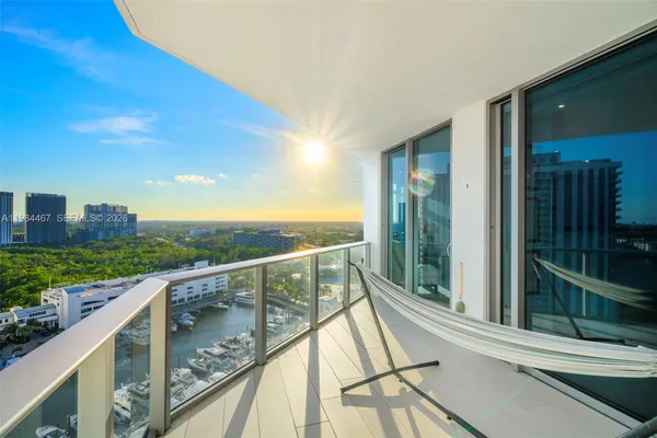 a view of a balcony with city view