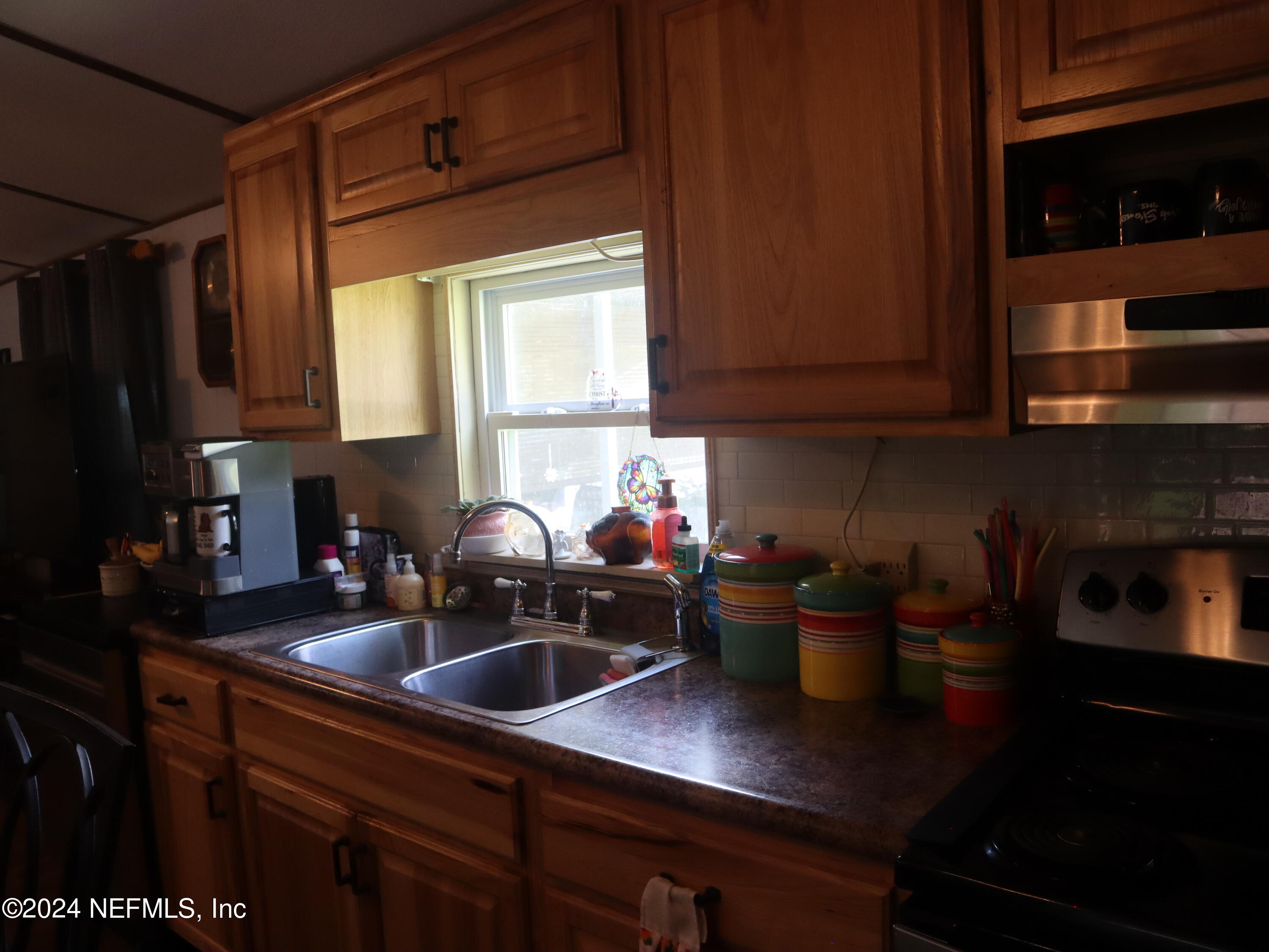 107 Fisherman Road Satsuma, FL 32189 - Photo 28 of 37 Kitchen Sink and Cabinets