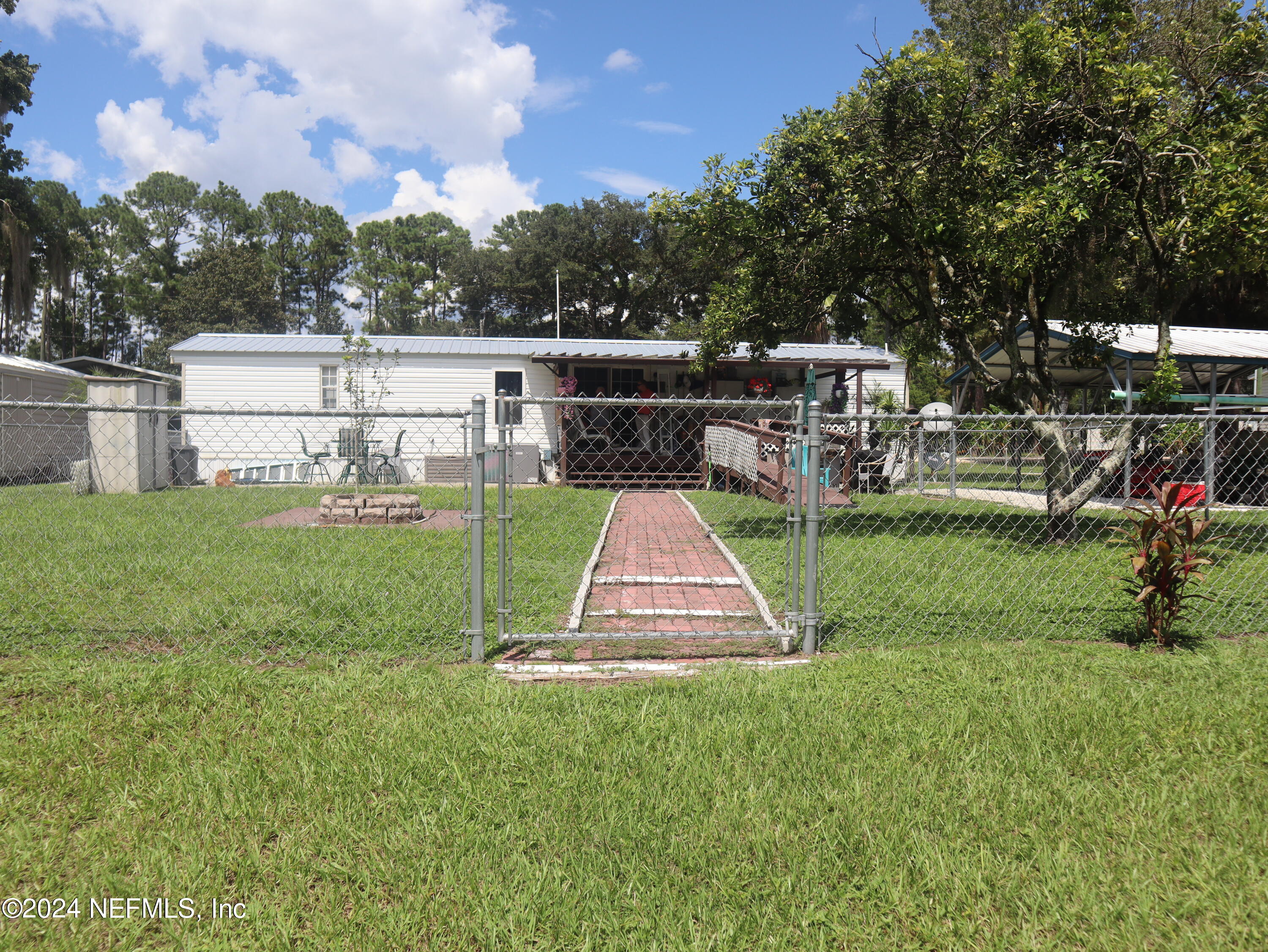 107 Fisherman Road Satsuma, FL 32189 - Photo 9 of 37 Backyard View of Home