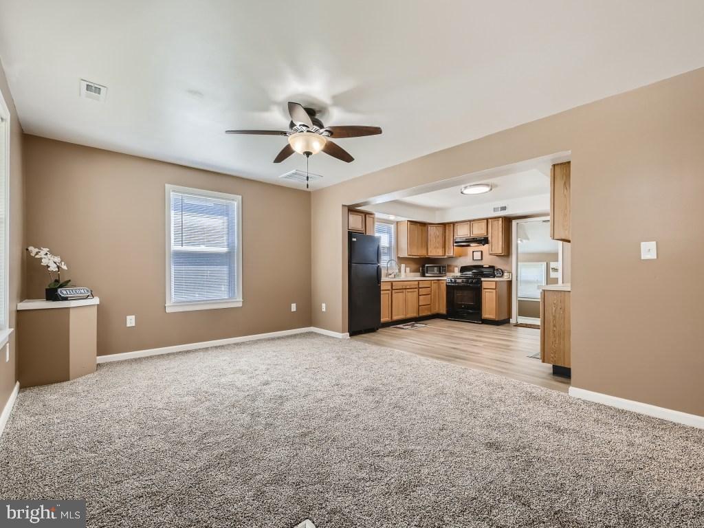 1704 Brookview Road Dundalk, MD 21222 - Photo 7 of 30 Spacious Living Room with new carpet!!