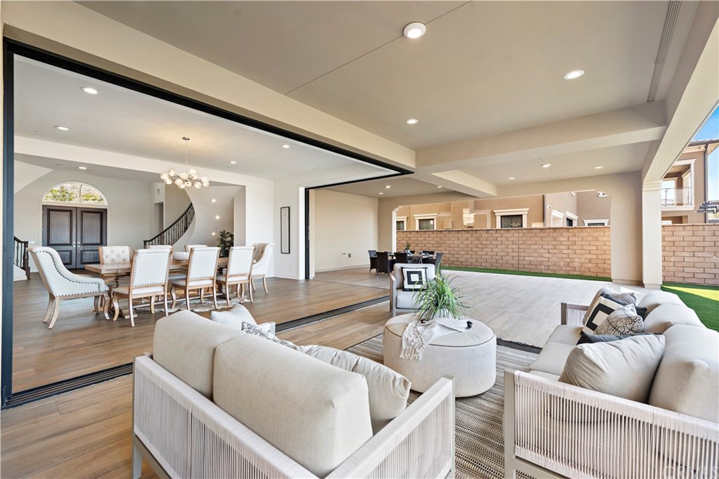 186 Leafy Pass Irvine, CA 92602 - Photo 30 of 59 a living room with furniture and a large window