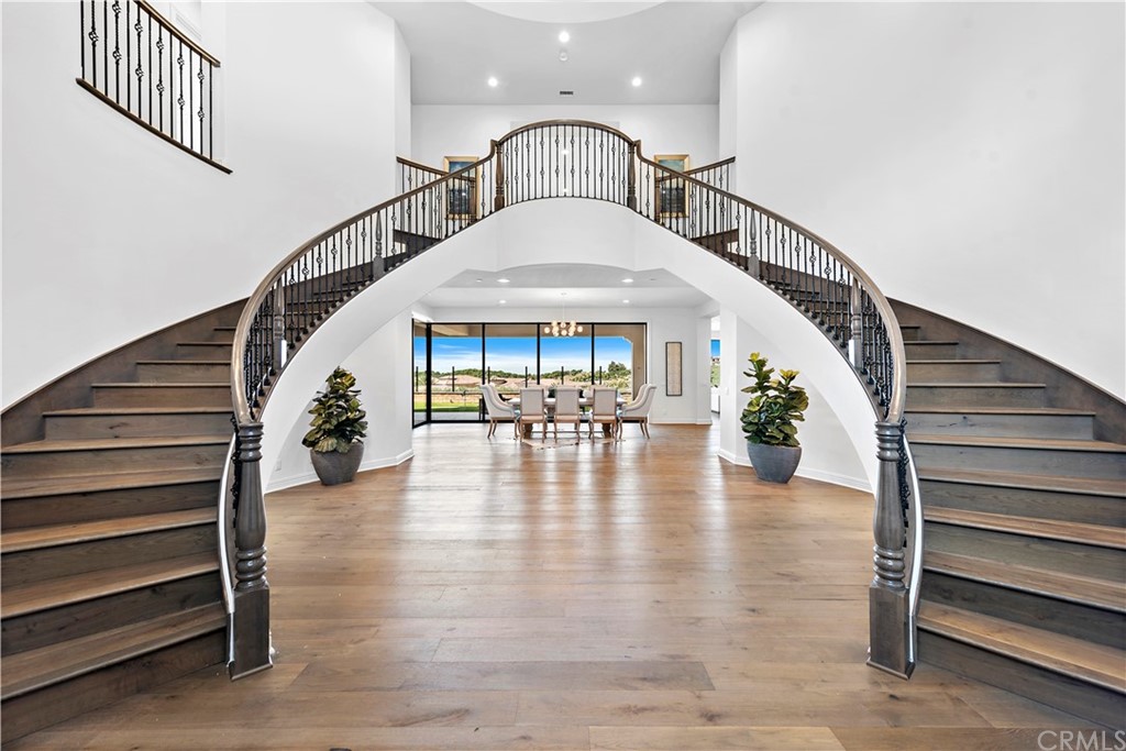 186 Leafy Pass Irvine, CA 92602 - Photo 4 of 59 a view of entryway livingroom and hall with wooden floor