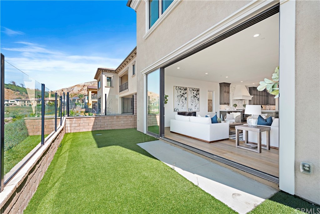 186 Leafy Pass Irvine, CA 92602 - Photo 35 of 59 a living room with furniture