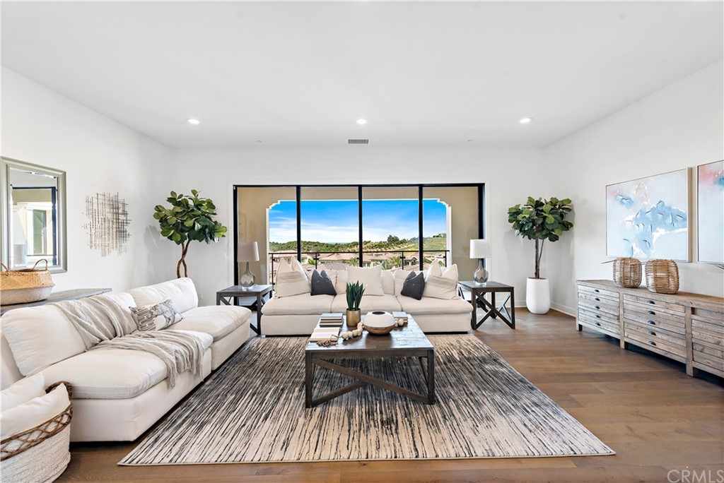 186 Leafy Pass Irvine, CA 92602 - Photo 36 of 59 a living room with furniture and a large window