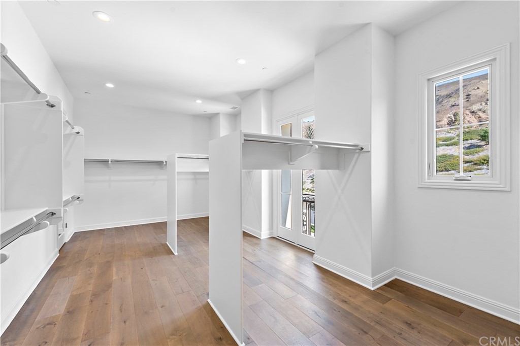186 Leafy Pass Irvine, CA 92602 - Photo 49 of 59 wooden floor in an empty room with a window