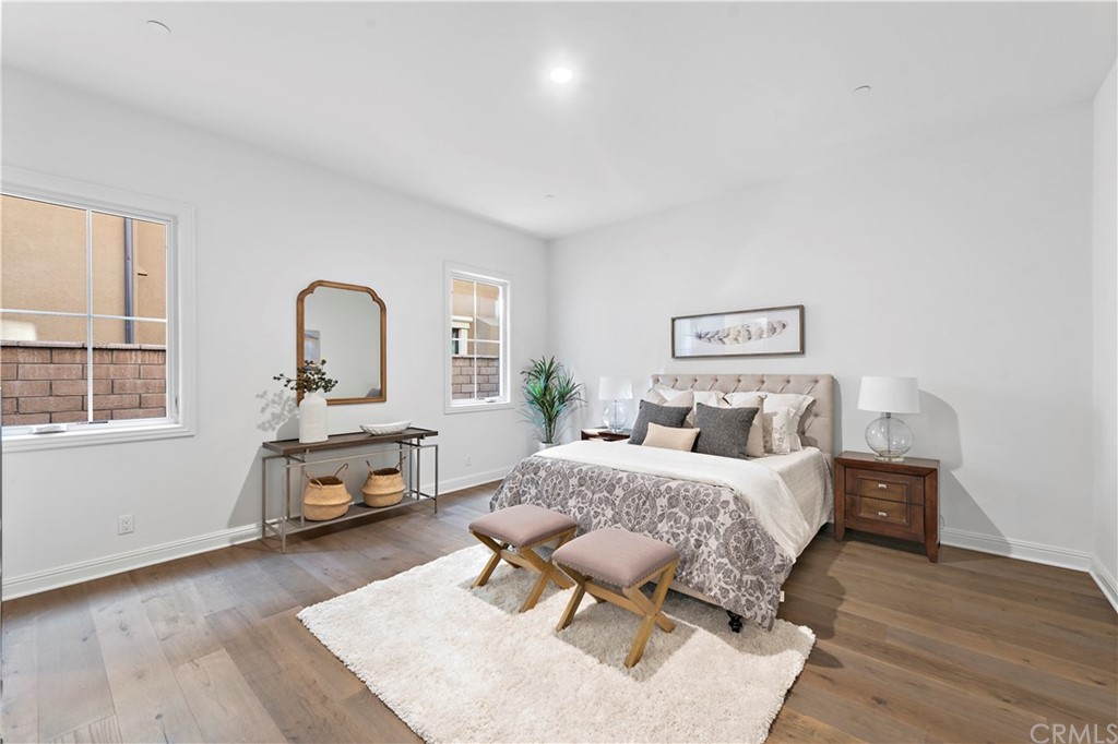 186 Leafy Pass Irvine, CA 92602 - Photo 6 of 59 a living room with furniture and a table