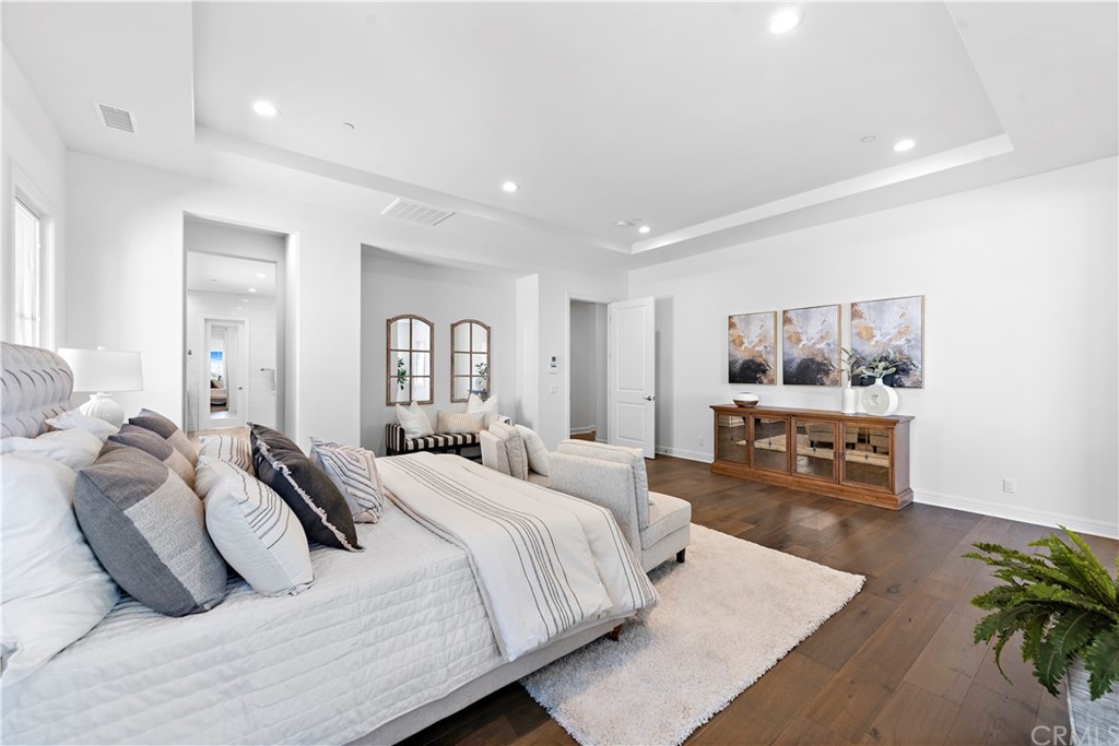 186 Leafy Pass Irvine, CA 92602 - Photo 51 of 59 a bedroom with a bed and a couch