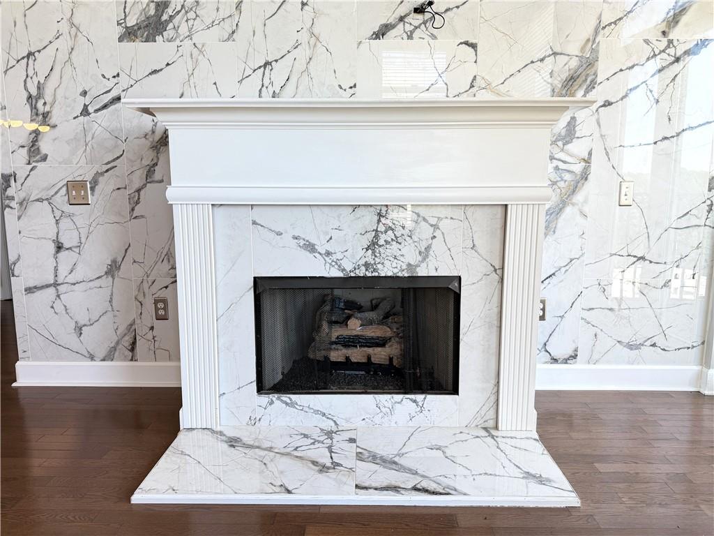 3820 Roswell Road Northeast, Unit 902 Atlanta, GA 30342 - Photo 15 of 20 a white building with a fireplace in it