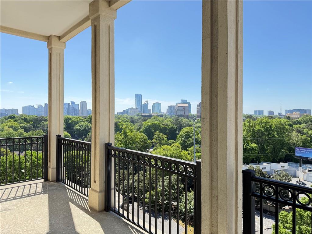 3820 Roswell Road Northeast, Unit 902 Atlanta, GA 30342 - Photo 18 of 20 a view of a balcony with wooden floor