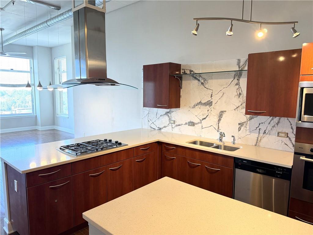 3820 Roswell Road Northeast, Unit 902 Atlanta, GA 30342 - Photo 5 of 20 a kitchen with a sink a stove and refrigerator