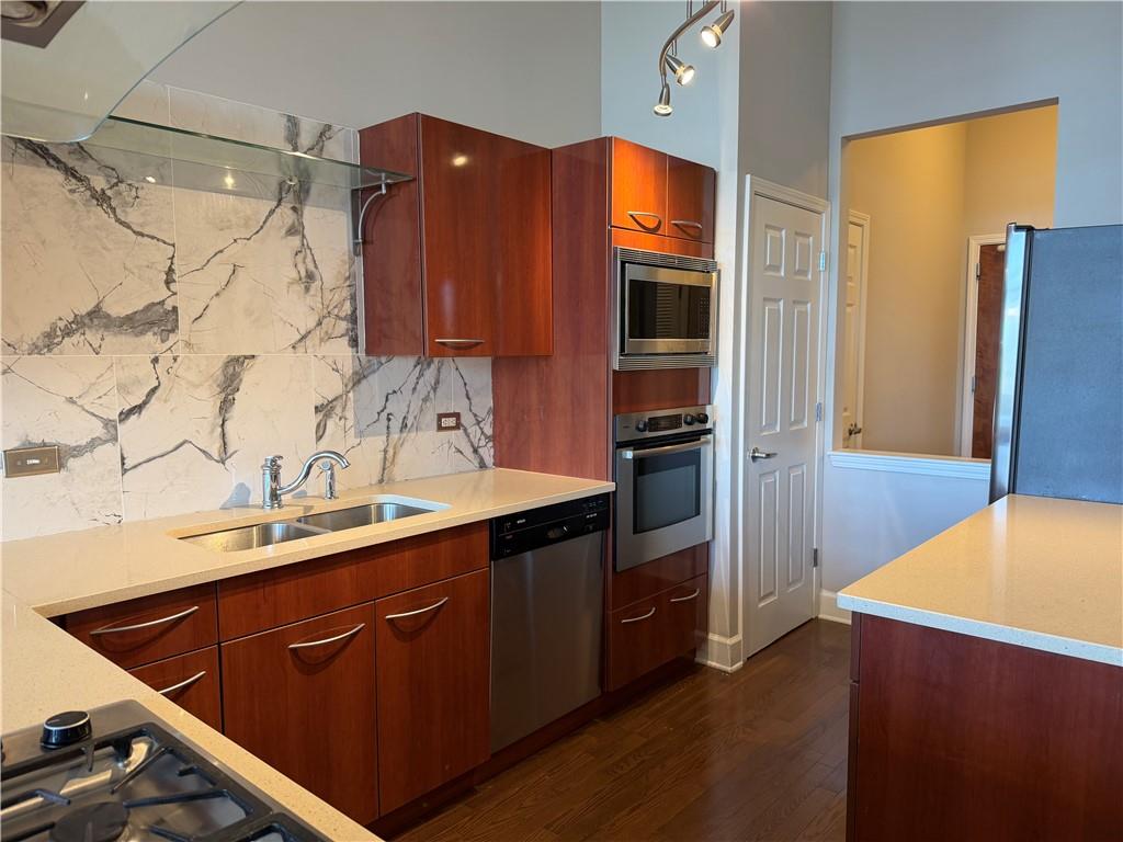 3820 Roswell Road Northeast, Unit 902 Atlanta, GA 30342 - Photo 6 of 20 a bathroom with a sink and a mirror
