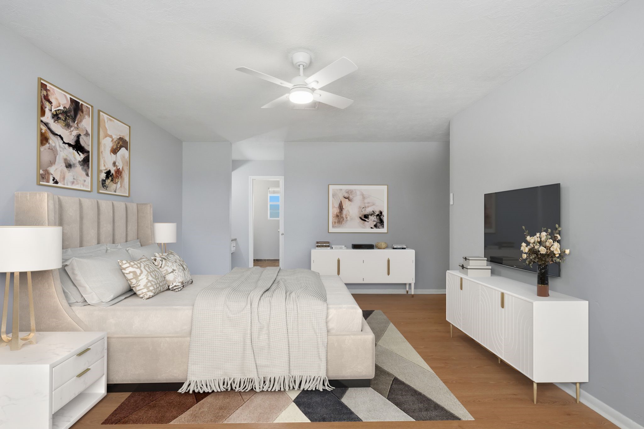 25611 Timberlane Drive Spring, TX 77386 - Photo 20 of 38 a bedroom with a large bed and a flat screen tv
