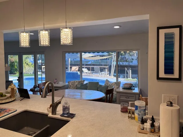 a bedroom with a large bed and dresser