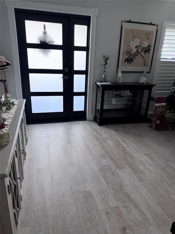 a view of a house with a yard and plants