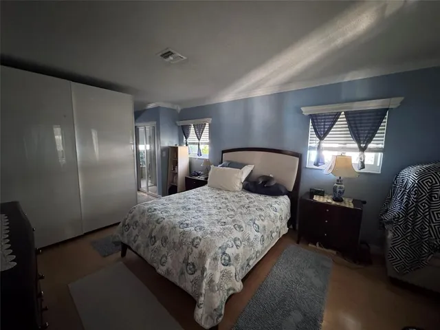 a view of a building with a tub and backyard of the house