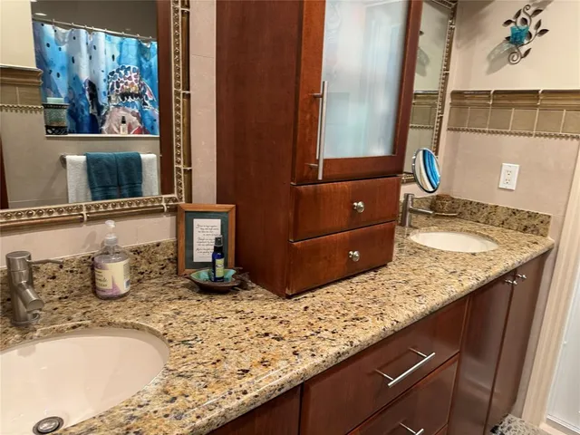 a view of a lake with sitting area