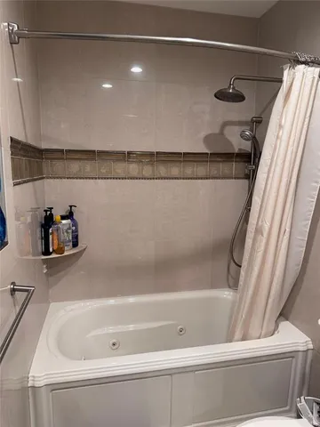 a view of backyard with outdoor seating and plants