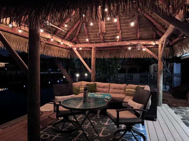 a kitchen with a refrigerator and a sink