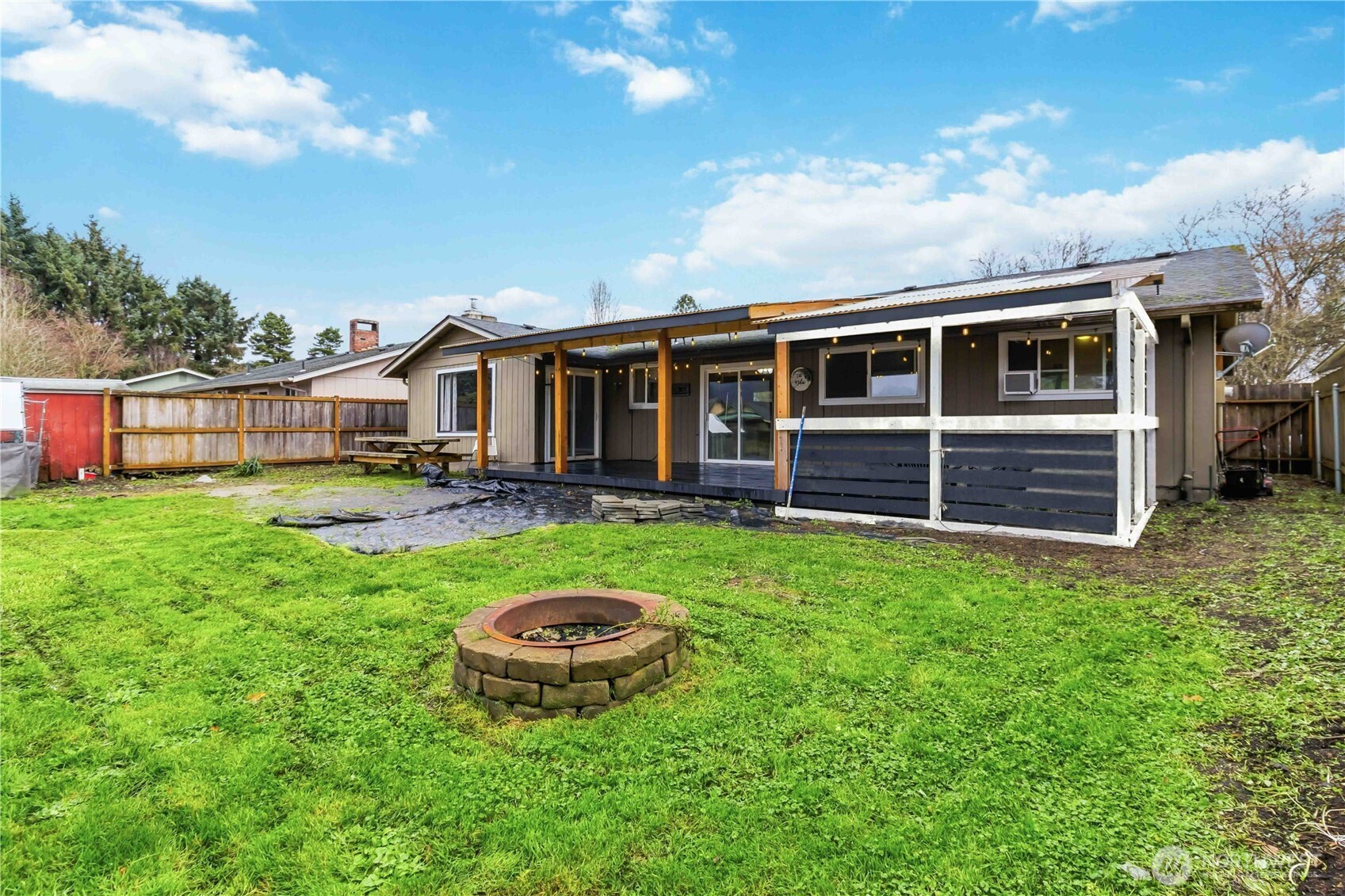 2323 48th Avenue Longview, WA 98632 - Photo 18 of 18 a view of a house with backyard space and balcony
