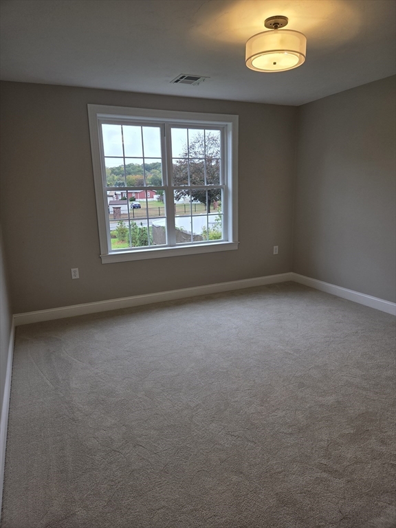 509 Mendon Road, Unit 509 Attleboro, MA 02703 - Photo 21 of 31 an empty room with a window