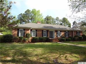 3526 High Ridge Road Charlotte, NC 28270 - Photo 1 of 16 a front view of a house with garden and porch