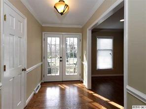 3526 High Ridge Road Charlotte, NC 28270 - Photo 2 of 16 wooden floor in an empty room with a window