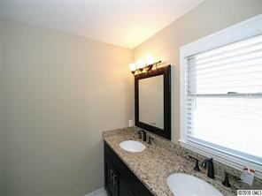 3526 High Ridge Road Charlotte, NC 28270 - Photo 11 of 16 a bathroom with a granite countertop sink and a mirror