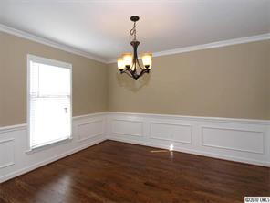 3526 High Ridge Road Charlotte, NC 28270 - Photo 4 of 16 a view of a room with wooden floor and windows