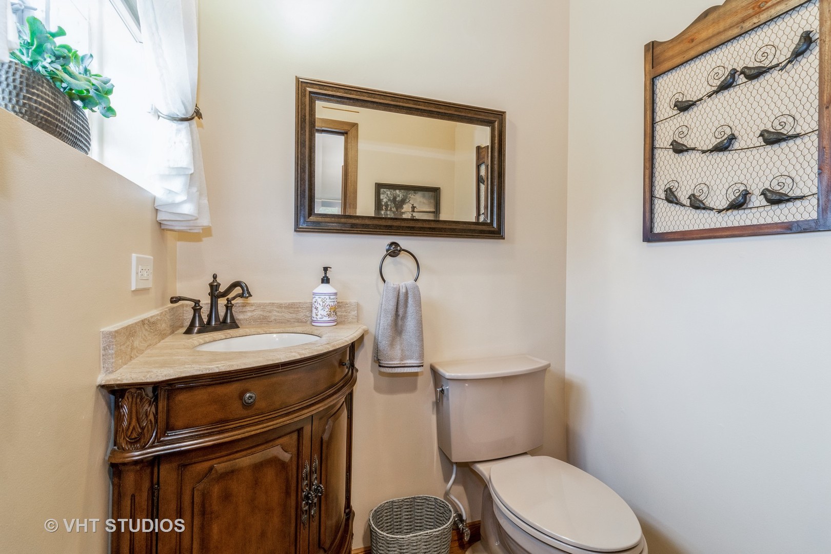 695 Vermont Road Frankfort, IL 60423 - Photo 14 of 20 a bathroom with a granite countertop toilet sink and mirror