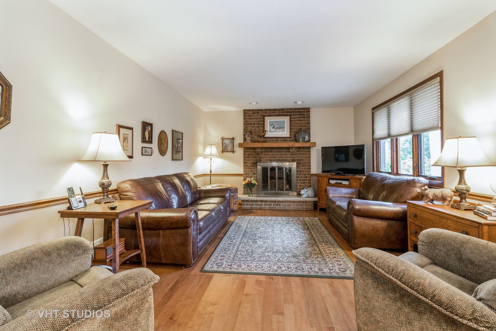 695 Vermont Road Frankfort, IL 60423 - Photo 8 of 20 a living room with furniture and a fireplace