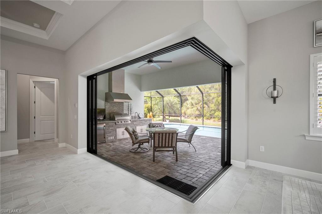 14227 Wild Timber Court Estero, FL 33928 - Photo 34 of 49 a view of a livingroom with furniture and wooden floor