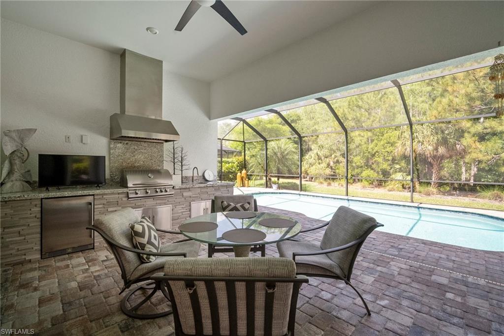 14227 Wild Timber Court Estero, FL 33928 - Photo 35 of 49 a view of a dining room with furniture window and outside view