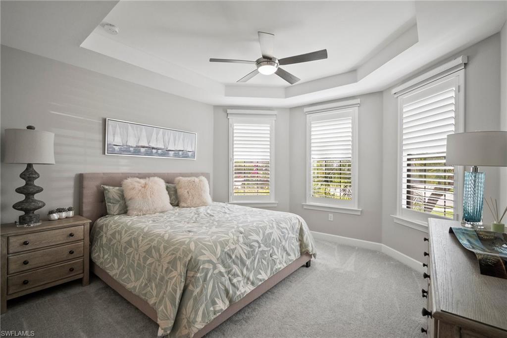 14227 Wild Timber Court Estero, FL 33928 - Photo 5 of 49 a bedroom with a bed and a window