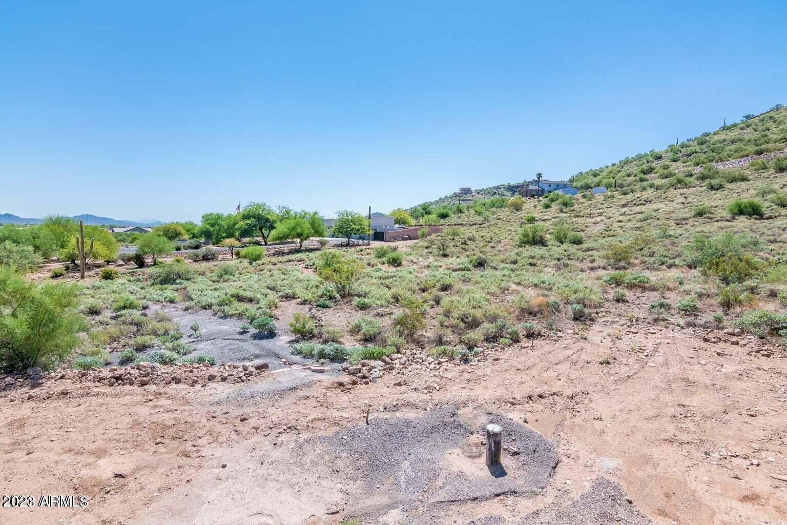 0 West Irvine Road Phoenix, AZ 85086 - Photo 8 of 13 a view of a large building with a view of mountains