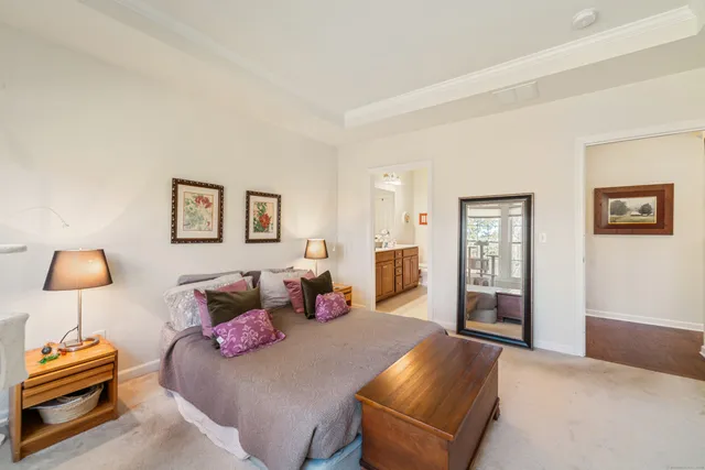 a bedroom with furniture and window