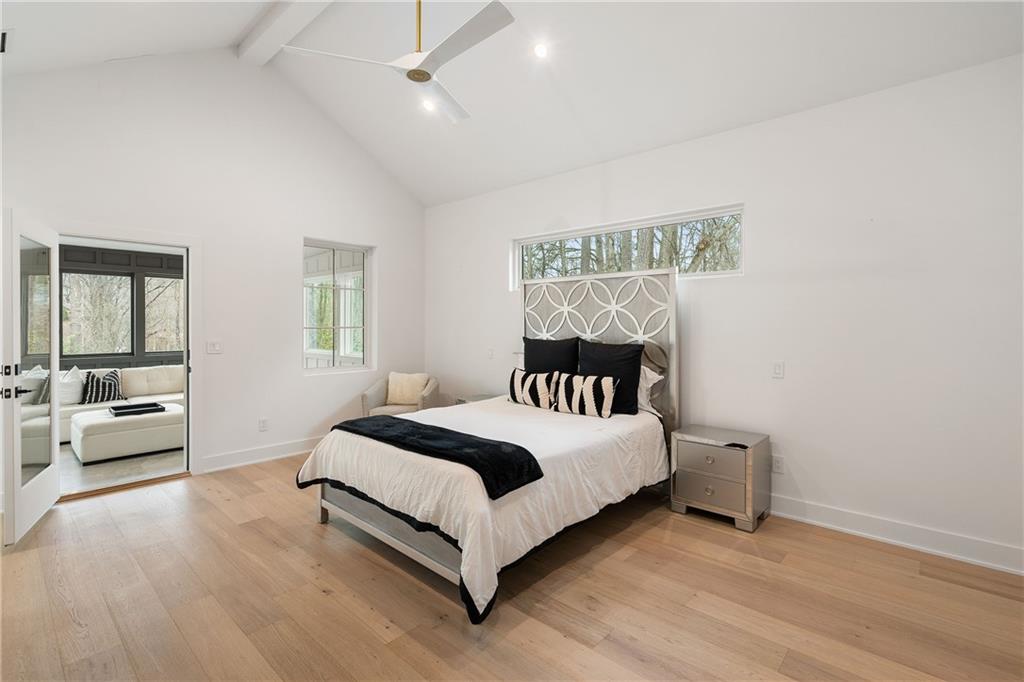 185 Pebble Trail Alpharetta, GA 30009 - Photo 37 of 55 a bedroom with a bed and a large window with outer view